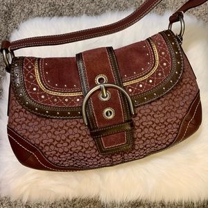 Coach leather shoulder bag with studs